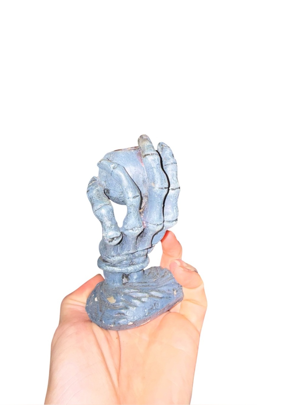 Vintage skeleton hand candle holder